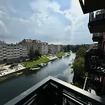 Downtown By The River
